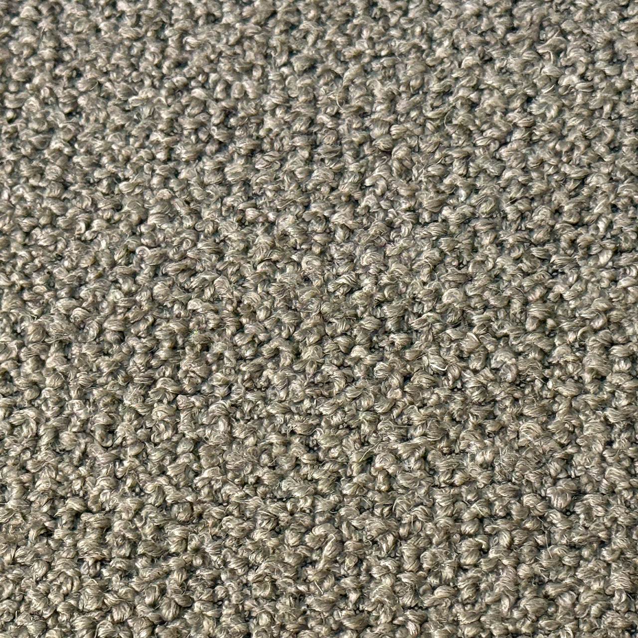 Grob gewebter Stoff in der Farbe graugrün