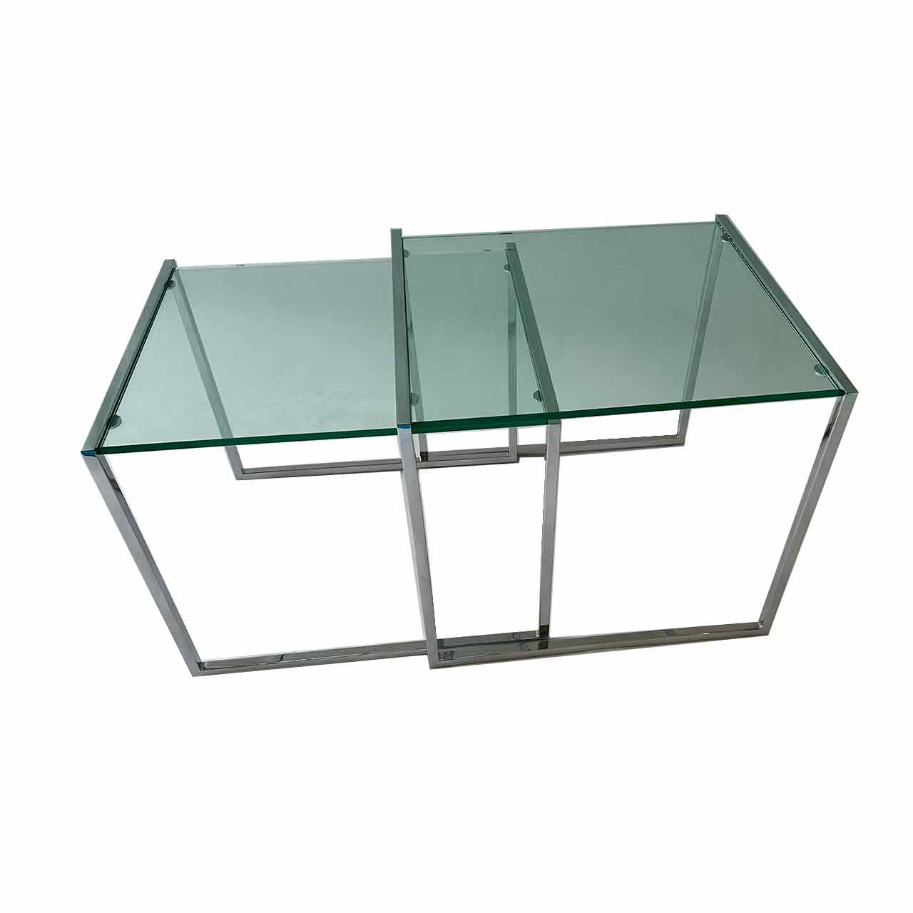 Ronald Schmitt - K9001 Zweisatz Glastisch Zwei Tische mit eckiger Glasplatte und chromfarbigem eckigem Gestell, der niedrigere Tisch ist etwas unter den anderen geschoben.